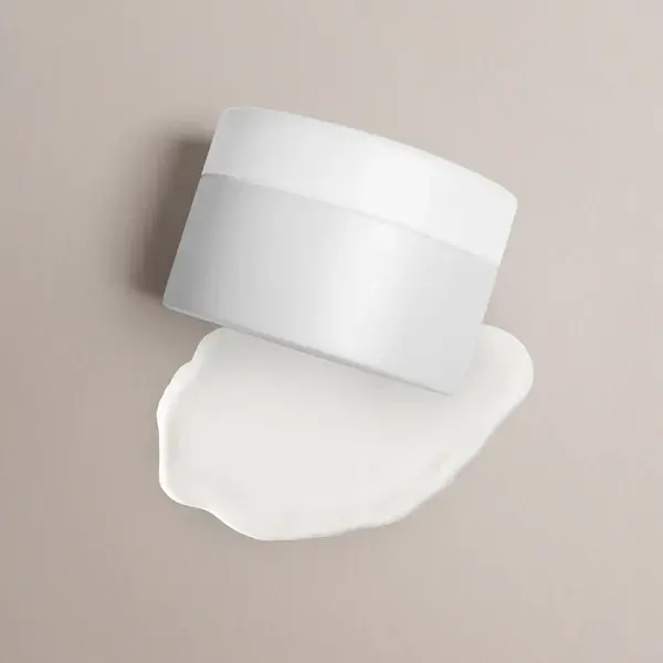 White jar of fragrance-free skin balm