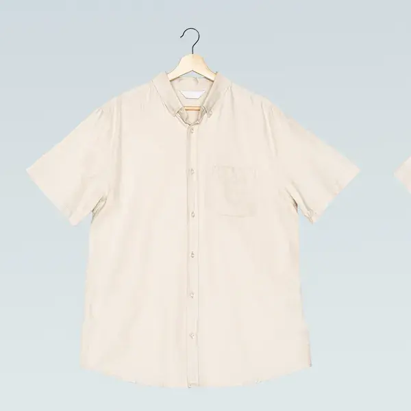 Cream short-sleeve linen shirt on a hanger