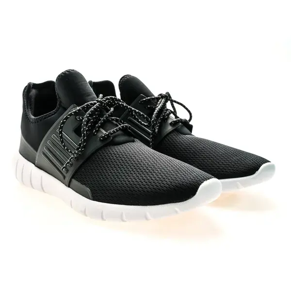Black mesh running shoes with white soles